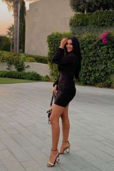 Aylin looks sexy in a tight fitting black dress and fuck me heels 