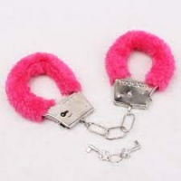 Fluffy pink handcuffs