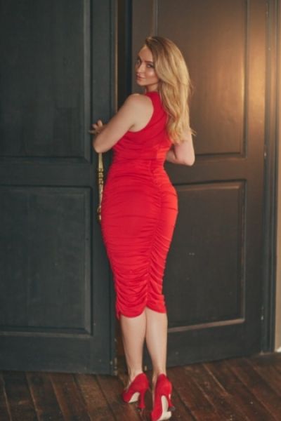 Our sexy blonde wearing a very sexy red dress 
