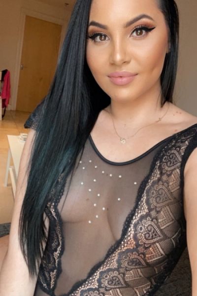 Looking very sexy in her see through lace top in this selfie 
