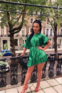 Melik is looking very sexy in a green dress 