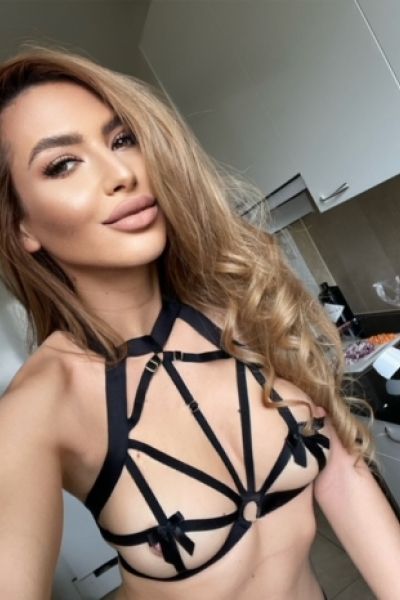 A very close up selfie of Clarice in black lingerie 