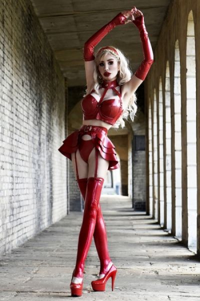 Blonde Mistress Eve looks very sexy in this red outfit 