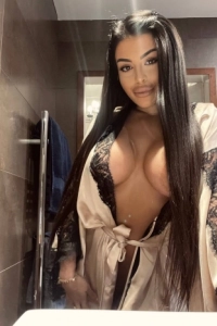 Georgia looks very sexy with her robe undone 