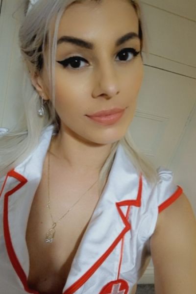 Selfie of Lacey in her nurse outfit 