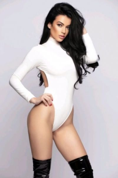 Demi looks very sexy in a white body 
