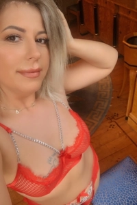 A selfie of Diana in her red lingerie 