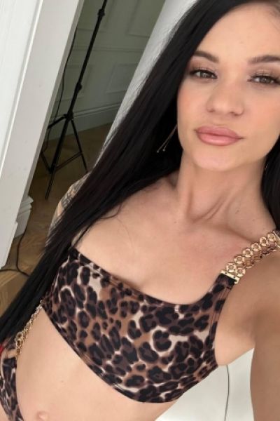 Carina looks sexy in her leopard print top 