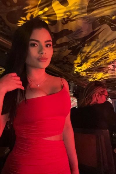 Gabby looks very sexy in this red dress