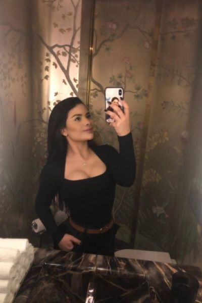 Bathroom selfie of sexy brunette escort Gabby 