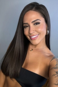 A selfie of a Brazilian escort with a very sexy tattoo 