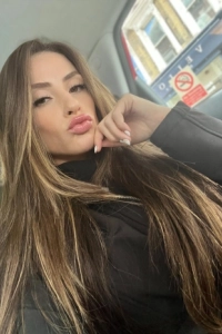 Brazilian London escort Melina showing off her blowjob lips 