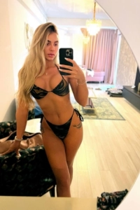 Zoey showing off her very sexy figure wearing black lingerie 