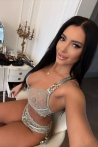 Kylie looks very sexy wearing a see through bra 