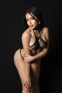 Vinessa is bending forward to show off her perfect boobs 