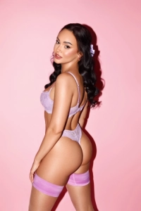 Julie showing off her arse wearing a pink thong 