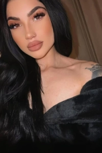 Selfie of Misty wearing a off the shoulder top 