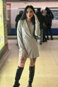 Full lenght seflie of a very sexy and casual looking London escort named Misty 