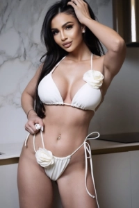 Kaisa is looking very sexy dressed in a white bikini 