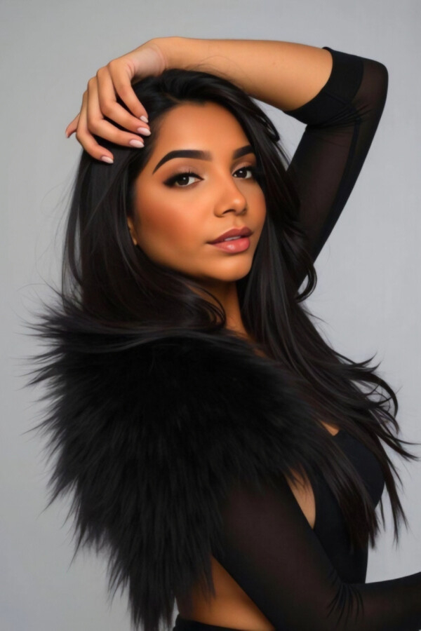 Jessamine Brazilian escort portrait in elegant black outfit with luxurious fur sleeves