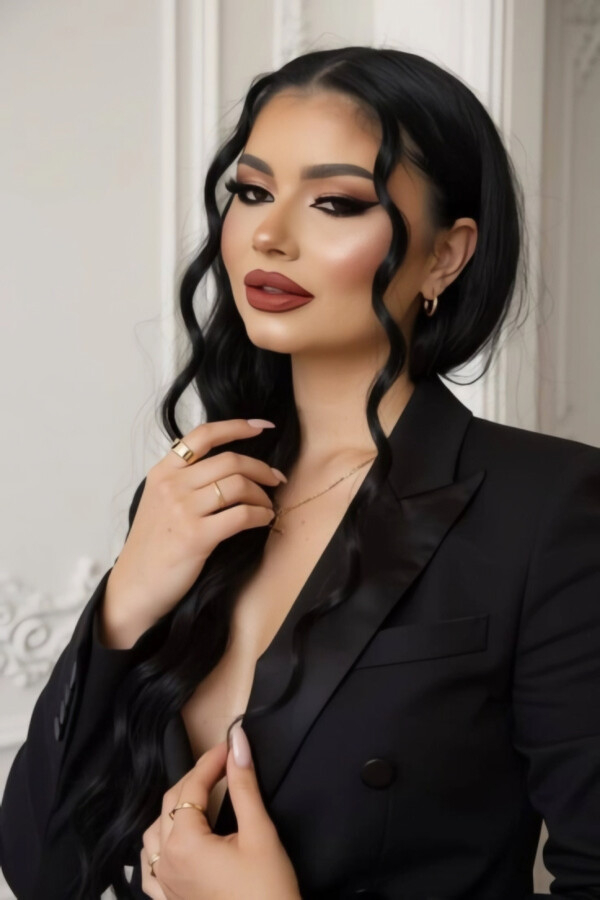 A lady wearing a black blazer