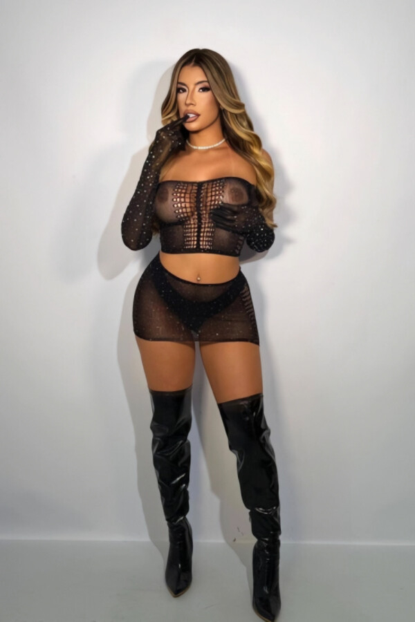 Busty Brazilian lady Camila wearing a sexy black lingerie set
